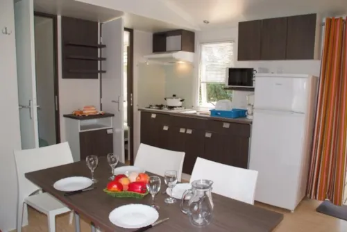 Mietunterkunft - Mobilheim Confort 29M² 3 Zimmer + Überdachte Terrasse + Clim - No Tv - image n°3 - Camping Le Château