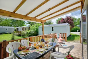 Locatif - Mobile home Confort 29m² 3 bedrooms with covered terrace + air conditionning + TV - Camping Le Château