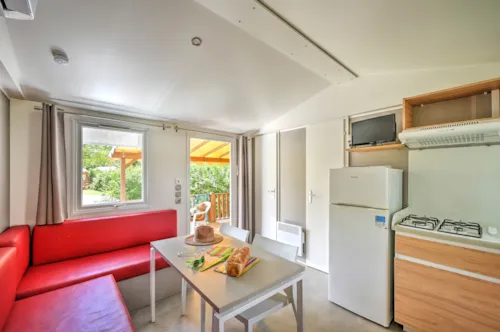 Accommodation - Mobile Home Confort 27M² 2 Bedrooms With Covered Terrace + Air-Conditioning + Tv - image n°4 - Camping Le Château