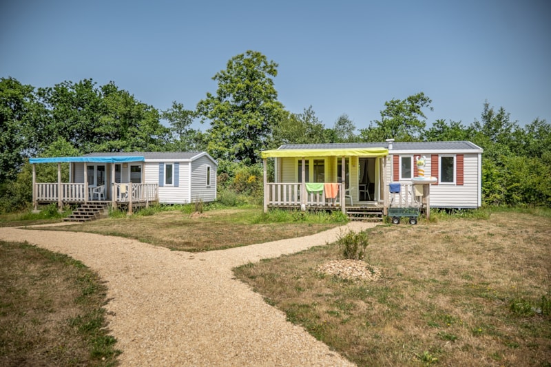 Hytte i Plougasnou – Mobil-home RIVIERA 2 chambres + Terrasse couverte + TV (27 m² / 2013) 1/4 Pers. – photo 7