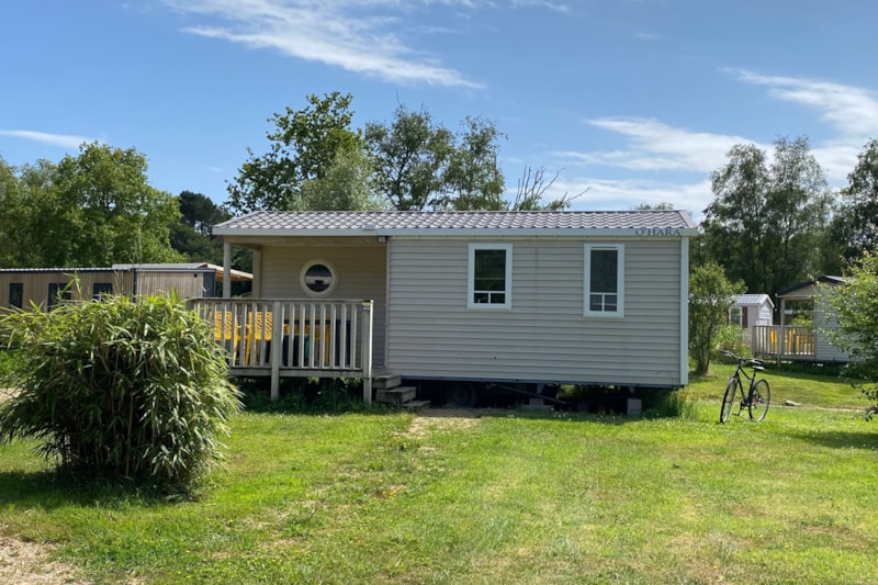 Mobilheim SIMPLY „Rando“: 2 Schlafzimmer + integrierte Terrasse + TV (25 m²/2014)