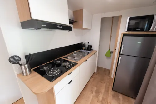 Location - Mobil-Home Premium Trendy 28M² Proximité Rivière- 2 Chambres + Terrasse Couverte - - image n°5 - Flower Camping la Pinède