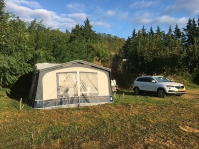 Camping pitch + tent or caravan + 1 vehicle or motorhome (excluding electricity and tourist tax)