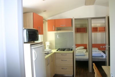 Air-conditioned Titeuf or Bandit Titania mobile home, 3 bedrooms, 32 m² + 18 m² semi-covered terrace