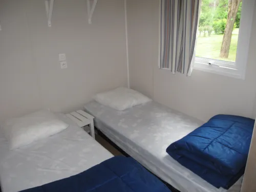 Mietunterkunft - Mobilheim 3 Zimmer - image n°7 - CAMPING LES FOULONS
