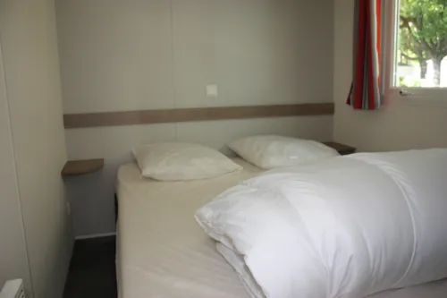Huuraccommodatie(s) - Comfortabele Stacaravan Met Airconditioning En 2 Slaapkamers - image n°3 - CAMPING LES FOULONS