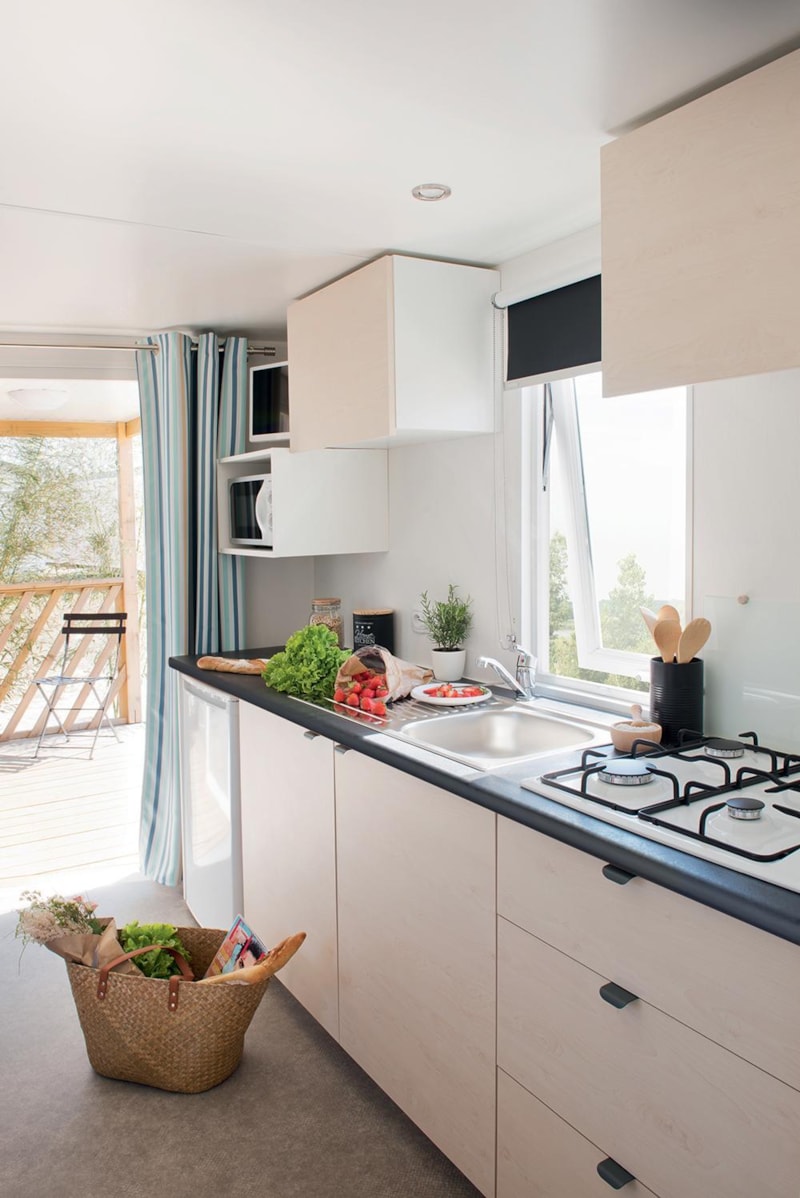 Mobil-home Confort 22m² 2 chambres + terrasse semi-couverte sur pilotis