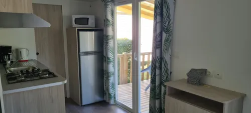 Location - Mobilhome Trigano Confort - Clim - 2 Chambres - image n°3 - Camping Le Gallo Romain