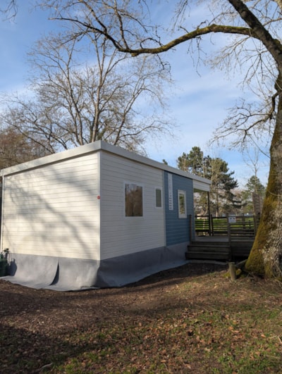 TRIO mobile home on the riverbank