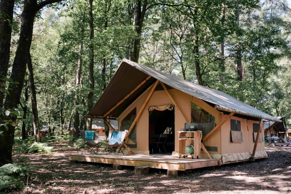 Location - Tente Toile & Bois Trappeur Poêle - Huttopia Lac de Sillé