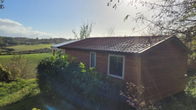 Chalet Premium 30m² (2 bedrooms) + sheltered terrace 12m² + TV + A/C