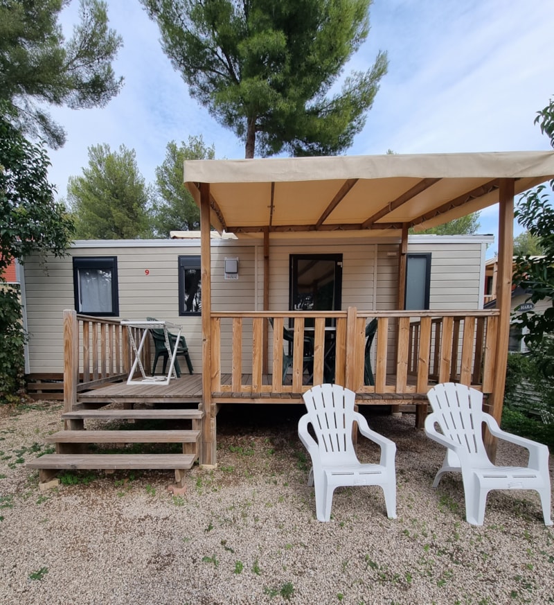 Mobile home Comfort 34² (3 bedrooms) + air conditioner+ sheltered terrace + television