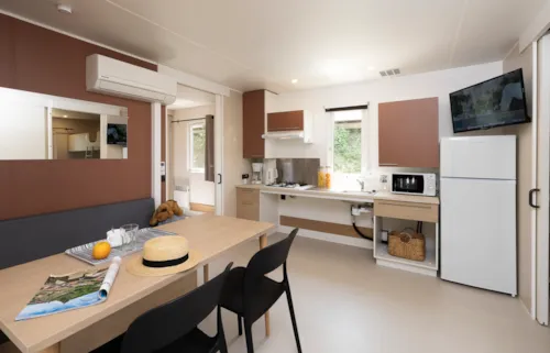 Location - Mobil Home Ciela Confort Pmr - 2 Chambres - image n°3 - Camping Le Pommier