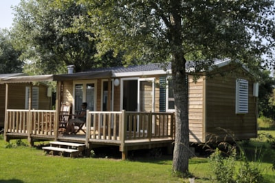 Mobile home Premium 2 bedrooms 27-32m² + Half-covered terrace + TV