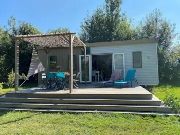 Mietunterkunft - Homeflower Premium 3 Zimmer 30.5M² + Halbüberdachte Terrasse + Tv - Flower Camping du Port Caroline