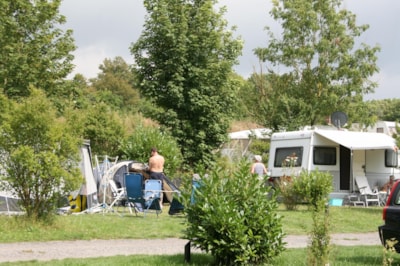 Pitch + car + tent or caravan by night