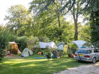 Pitch + car + tent or caravan by night