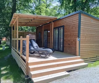 Huuraccommodatie(s) - Homeflower Premium 29M² (2 Kamers) + Air Conditioning + Halfoverdekt Terras + Tv + Lakens + Doeken - Flower Camping La Chênaie