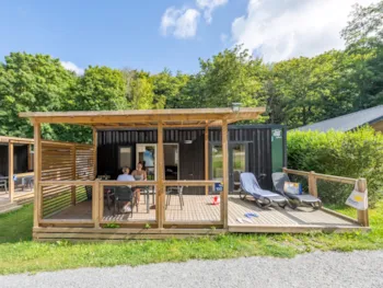 Huuraccommodatie(s) - Homeflower Premium 35M² (3 Kamers) + Air Conditioning + Halfoverdekt Terras + Tv + Lakens + Doeken - Flower Camping La Chênaie