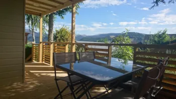 Mietunterkunft - Chalet Clochettes 26,5M² + Überdachte Terrasse 13,5M² - 2 Schlafräume - Tv - Waschgelegenheit - Camping Le Panoramique 