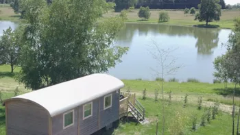 Mietunterkunft - Planwagen - 2 Zimmer - 1 Badezimmer - Irm - Castel Camping Château de Poinsouze