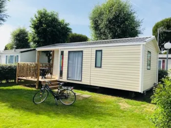 Mietunterkunft - Mobilheim - 2 Schlafzimmer - Überdachte Terrasse / Halbüberdachte Terrasse - Tv - - Camping Kérabus