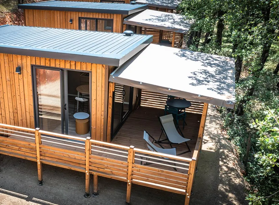 Mietunterkunft - Key Westotel 2 Pers. A/C + Bettwäsche- Und Handtuchset Inklusive - Campasun Camping de l’Aigle