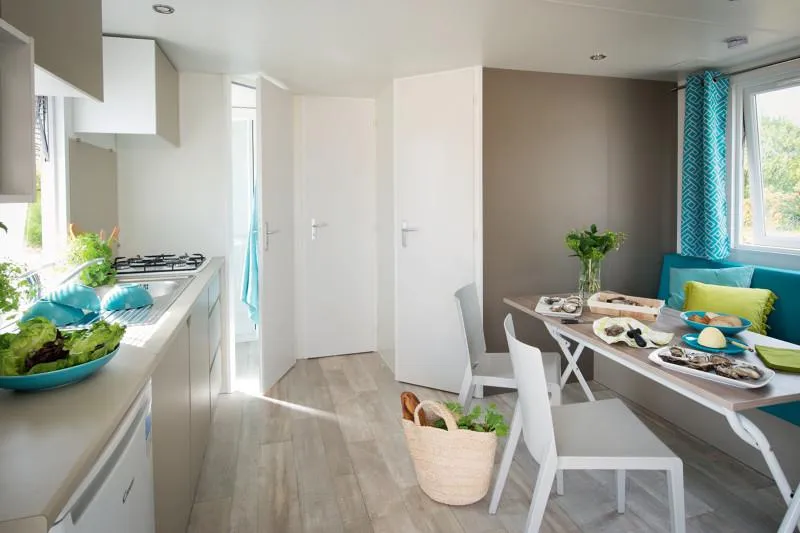 Mobilhome  Evasion: 2 Chambres, 27.5M², Terrasse Couverte, Climatisation.