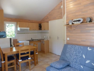 Chalet Confort -35m² -2 bedrooms - semi-covered terrace - TV - Air conditioning
