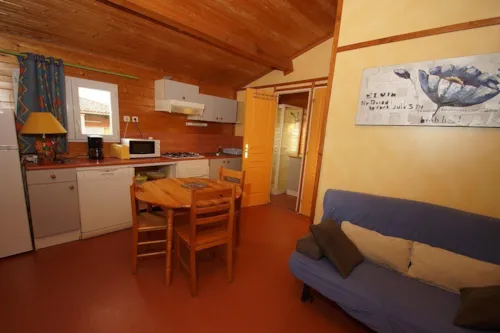 Mietunterkunft - Hütte Edelweiss 34M² - 2 Zimmer - image n°2 - Camping l'Oasis des Garrigues