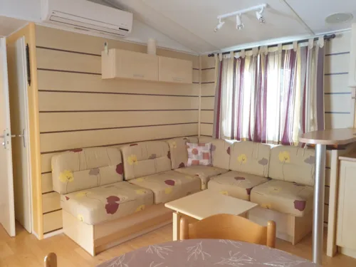 Location - Mobil-Home Propriétaire - 28M² - 2 Chambres (Année 2001-2006) - image n°2 - Camping l'Oasis des Garrigues