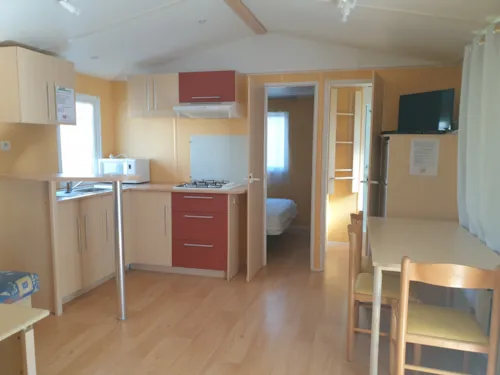Location - Mobil-Home Propriétaire - 28M² - 2 Chambres (Année 2001-2006) - image n°4 - Camping l'Oasis des Garrigues