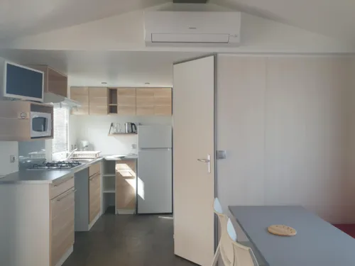 Huuraccommodatie(s) - Stacaravan Confort (Van De Eigenaar) - 28M² - 2 Slaapkamers (Jaar 2013) - image n°5 - Camping l'Oasis des Garrigues