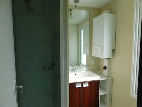 Mietunterkunft - Mobilheim Komfort Mit Klimaanlage + Tv - image n°4 - Camping les Chênes