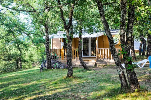 Mietunterkunft - Cottage "Laurier" - 2 Schlafzimmer - Reihe Confort - image n°2 - Camping L'Ombrage