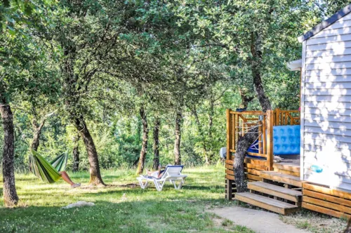 Mietunterkunft - Cottage "Laurier" - 2 Schlafzimmer - Reihe Confort - image n°7 - Camping L'Ombrage