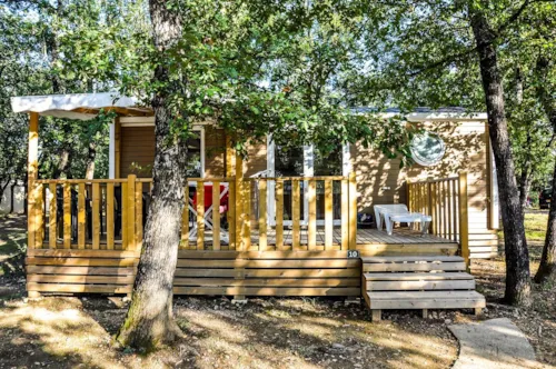 Mietunterkunft - Cottage "Laurier" - 2 Schlafzimmer - Reihe Confort - image n°6 - Camping L'Ombrage