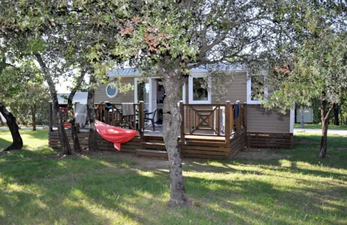 Mietunterkunft - Cottage "Laurier" - 3 Schlafzimmer - Reihe Confort - image n°4 - Camping L'Ombrage