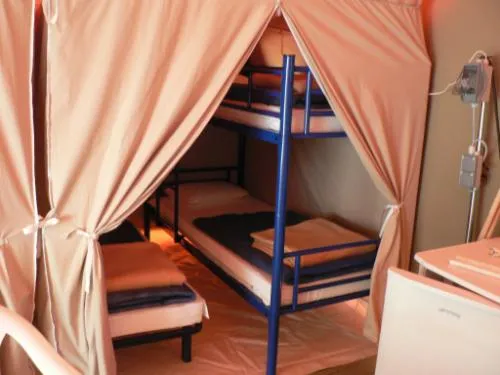 Mietunterkunft - Zeltbungalow Canada N°2 - image n°4 - Camping Les Acacias