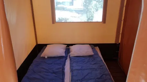 Location - Bungalow Toilé (Sans Sanitaires) - image n°6 - Camping Ibie