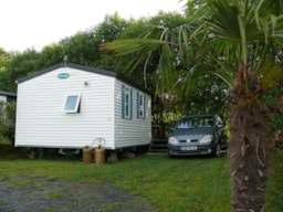 Accommodation - Bedroom Mobile Home 4-Person, Double Slope Roof, 24 M², Semi-Covered Wood Terrace - Plein Air Locations - camping Oyam