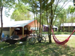 Accommodation - Toilé Nature Confort 25M² - 4 Ad + 1 Ch - Without Toilet Blocks - Camping Koawa Lac de Thoux St-Cricq