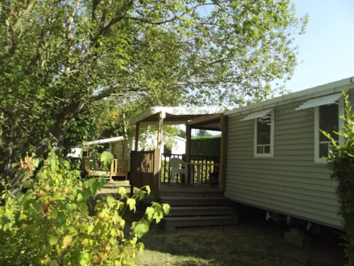 Location - Mobil-Home Confort (27M²) Avec Terrasse Couverte, 2 Chambres, Climatisé - image n°3 - Camping le Grand Cerf