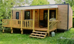 Locatif - Mobil-home PREMIUM (33m²) , 2 chambres, clim, TV, Lave-vaisselle, terrasse, lit Queen Size - Camping le Grand Cerf