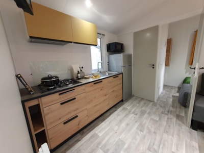 Mobile-home - 25m2 (2021) + 8m2 semi-covered wooden terrace. — 3