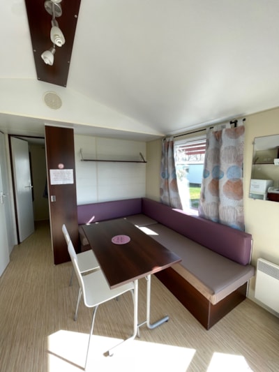 Mobile-home 26m² + integrated semi-covered wooden terrace of 7m². — 4