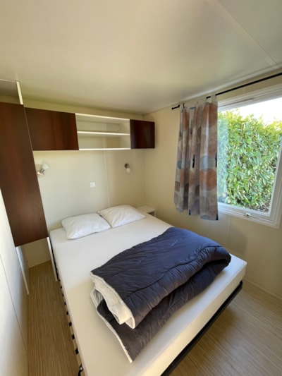 Mobile-home 26m² + integrated semi-covered wooden terrace of 7m². — 7