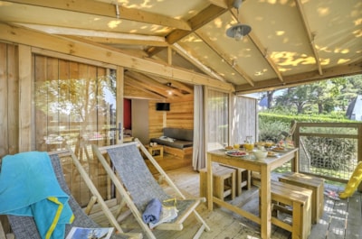 Cabin lodge Cosyflower PREMIUM 38m² 2 bedrooms of which covered terrace 10m² + TV + with sheets