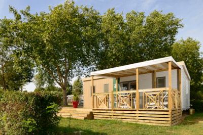 Mobile home 35m² COMFORT (3 bedrooms) + AIR CONDITIONING + semi-covered terrace + TV + dishwasher