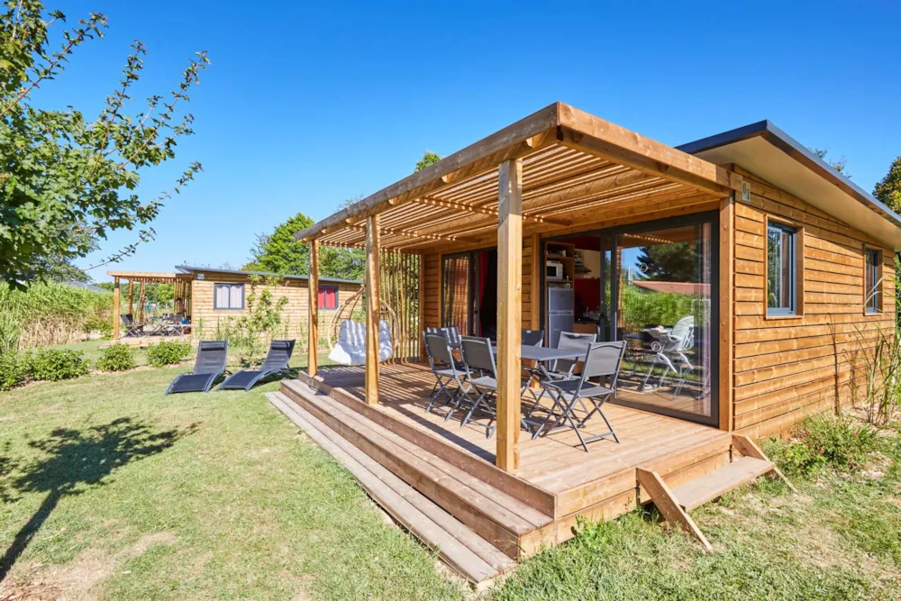 Location - Premium Chalet Ottawa 33M² 6 P. (3 Chambres) + Terrasse Couverte - Flower Camping du Lac de La Chausselière